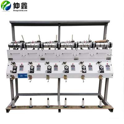 Textile yarn thread reel winding machine